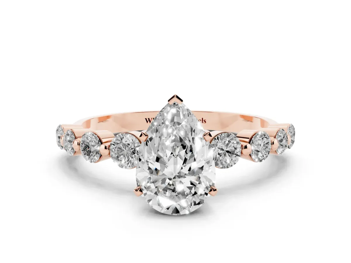 Pear Cut Solitaire Diamond Ring with Pave Band and Four-Prong Setting Rose gold
