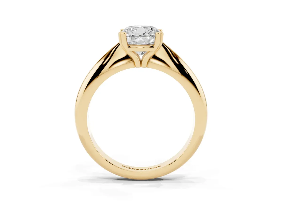 Cushion Cut Cut Solitaire Engagement Ring with Tapered Band and Four-Prong Setting Yellow gold