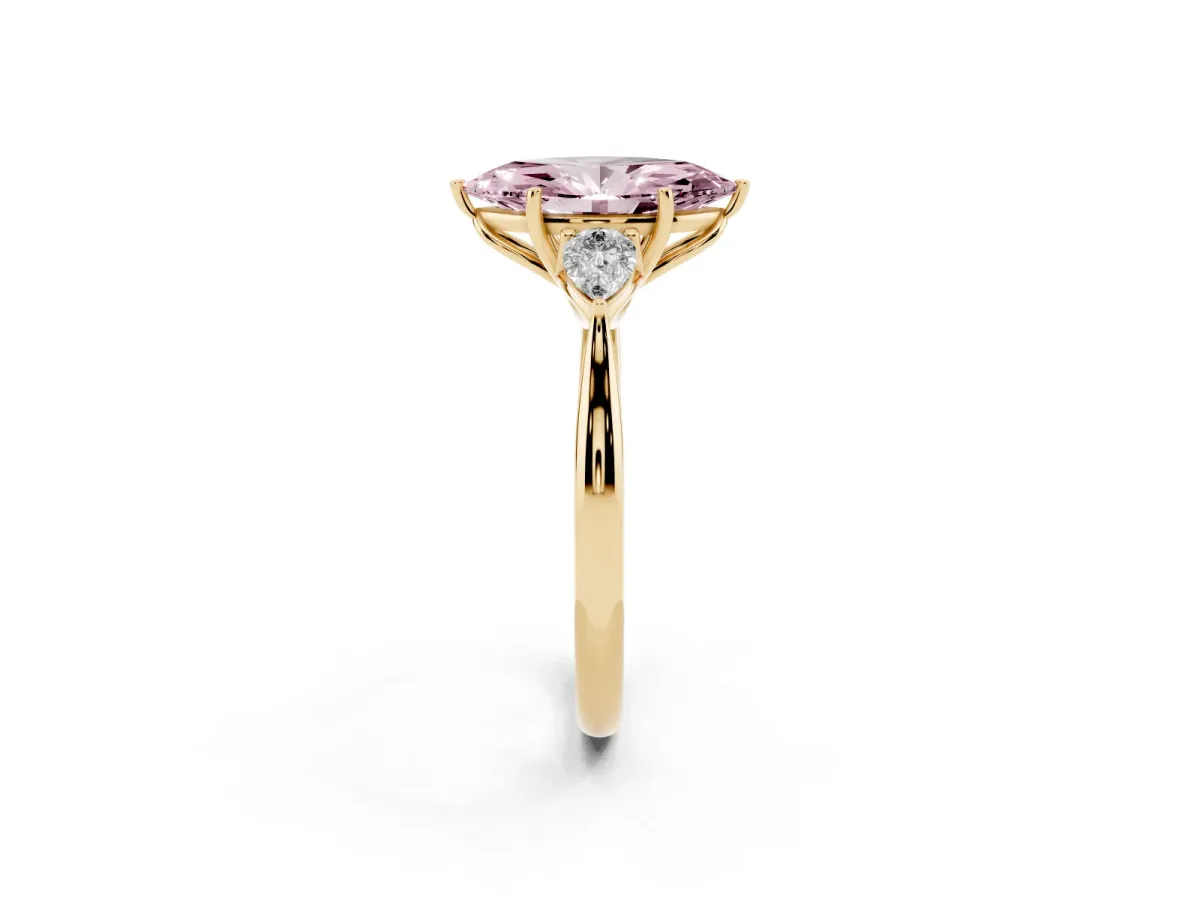 Fancy Pink Marquise Cut Diamond Three-Stone Ring with Pear Side Stones and Prong Setting Yellow gold