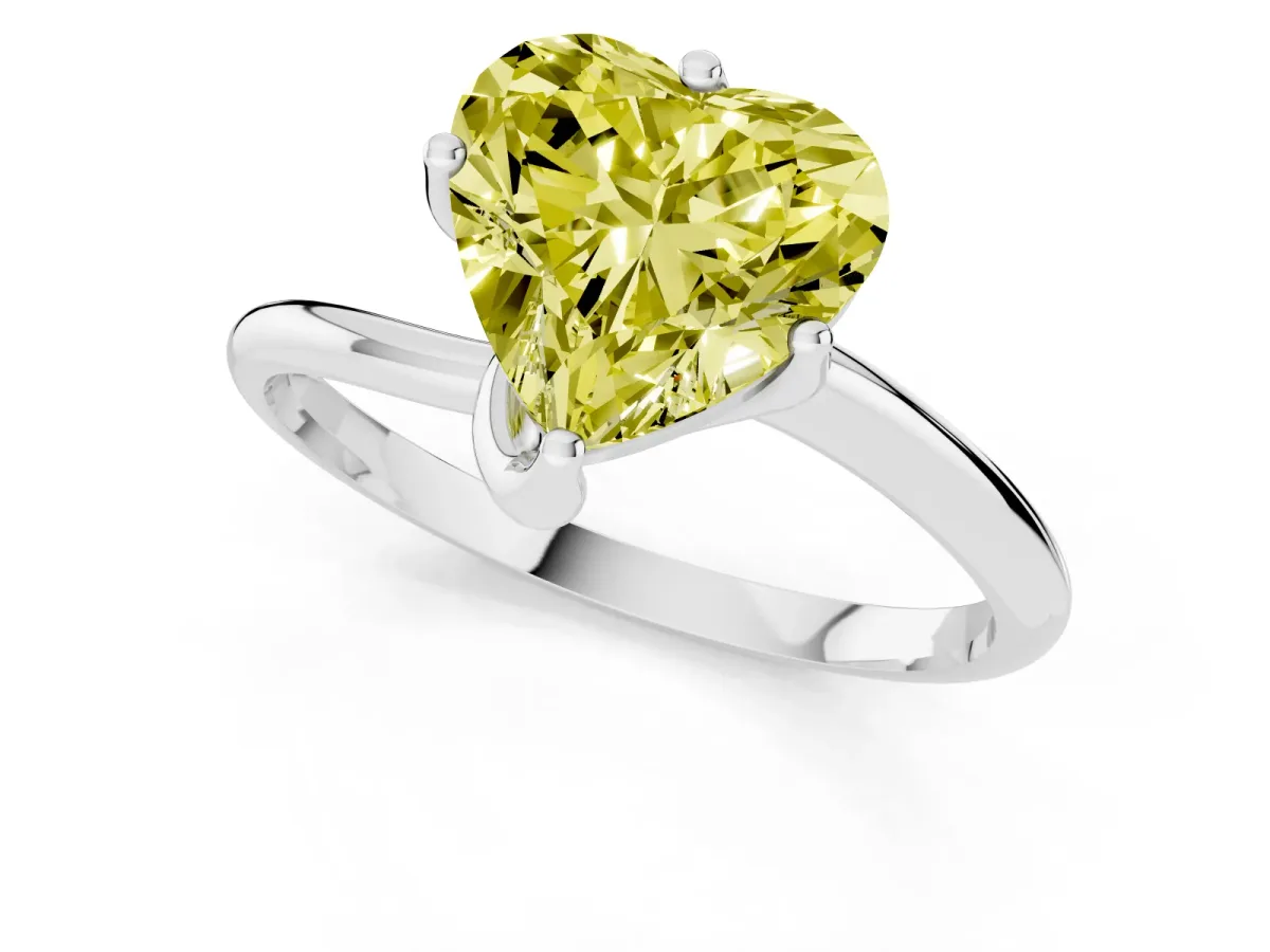Fancy Yellow Heart Cut Diamond Solitaire Engagement Ring with Four-Prong Setting and Classic Band Silver