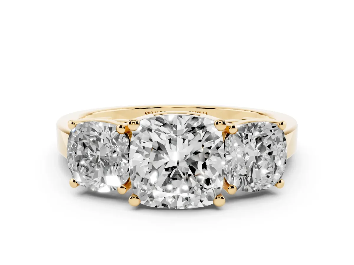 Three-Stone Cushion Cut Cut Diamond Engagement Ring with Flat Band and Four-Prong Setting Yellow gold