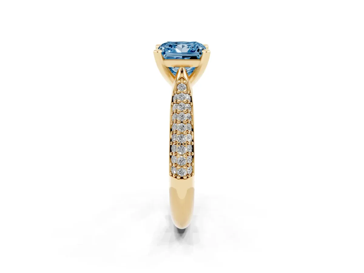 Fancy Blue Princess Cut Diamond Solitaire Engagement Ring with Multi-Row Round Pavé Band and Prong Setting Yellow gold