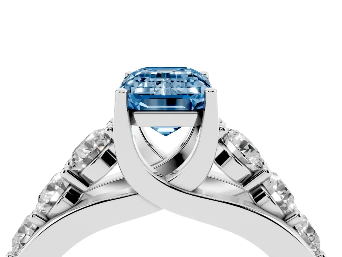 Fancy Blue Emerald Cut Diamond Engagement Ring with Pavé Band and Four-Prong Setting Silver