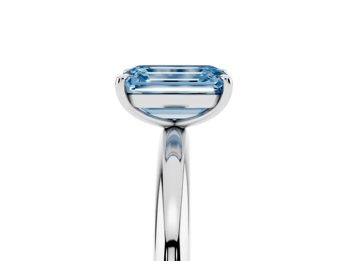 Fancy Blue Emerald Cut Solitaire Diamond Ring with Four-Prong Setting on a Plain Band White gold