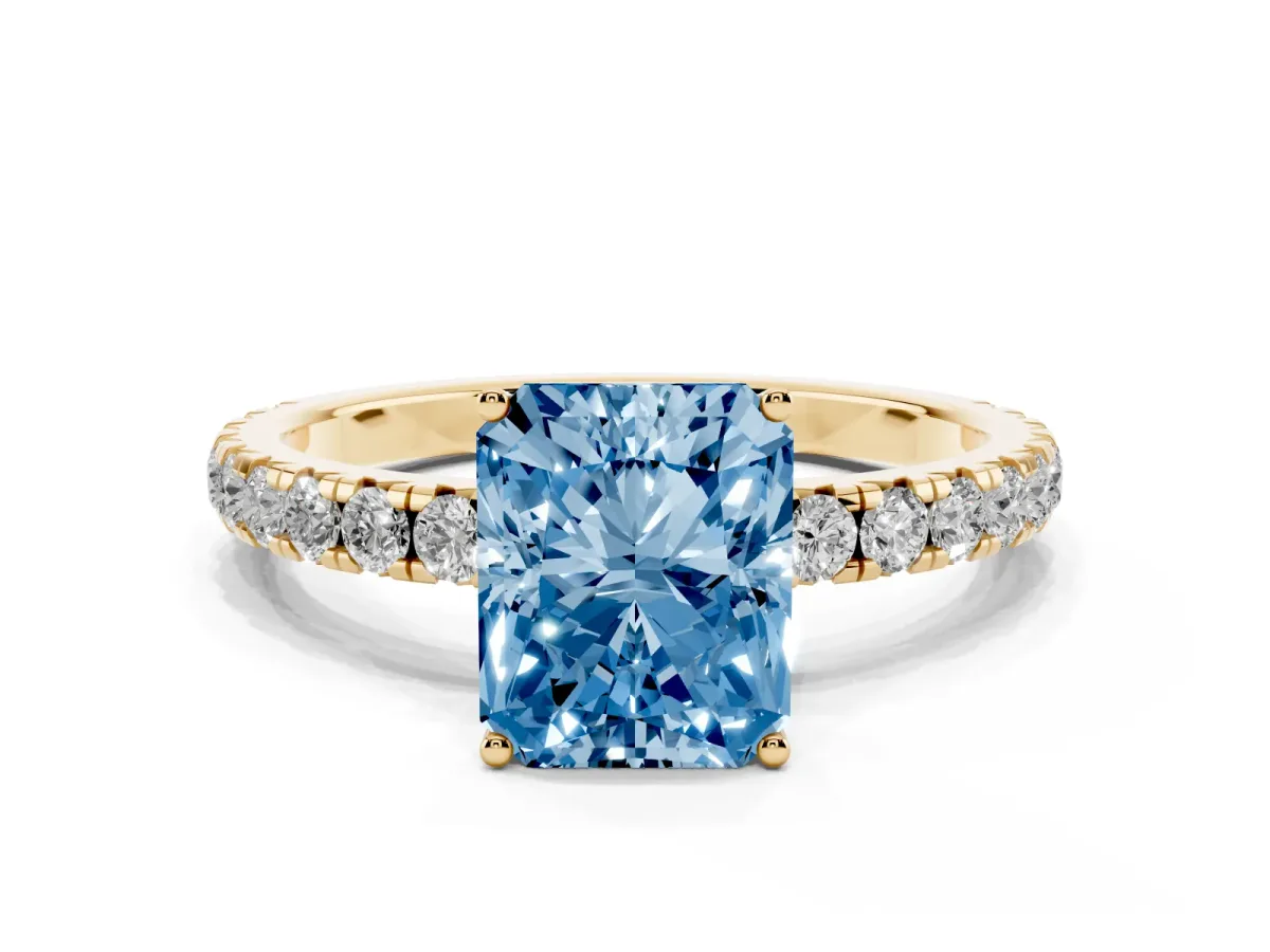 Fancy Blue Radiant Cut Diamond Pavé Solitaire Engagement Ring with Four-Prong Setting Yellow gold