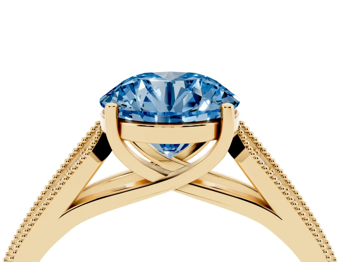 Fancy Blue Round Cut Cut Pave Split Shank Engagement Ring with Four-Prong Setting Yellow gold