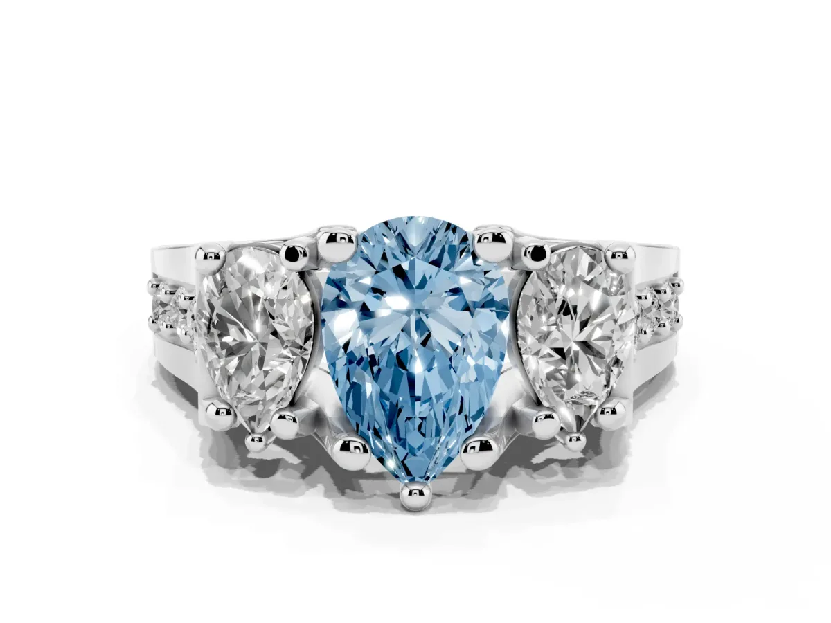Fancy Blue Pear Cut Diamond Three-Stone Ring with Channel Set Band and Four-Prong Setting Silver