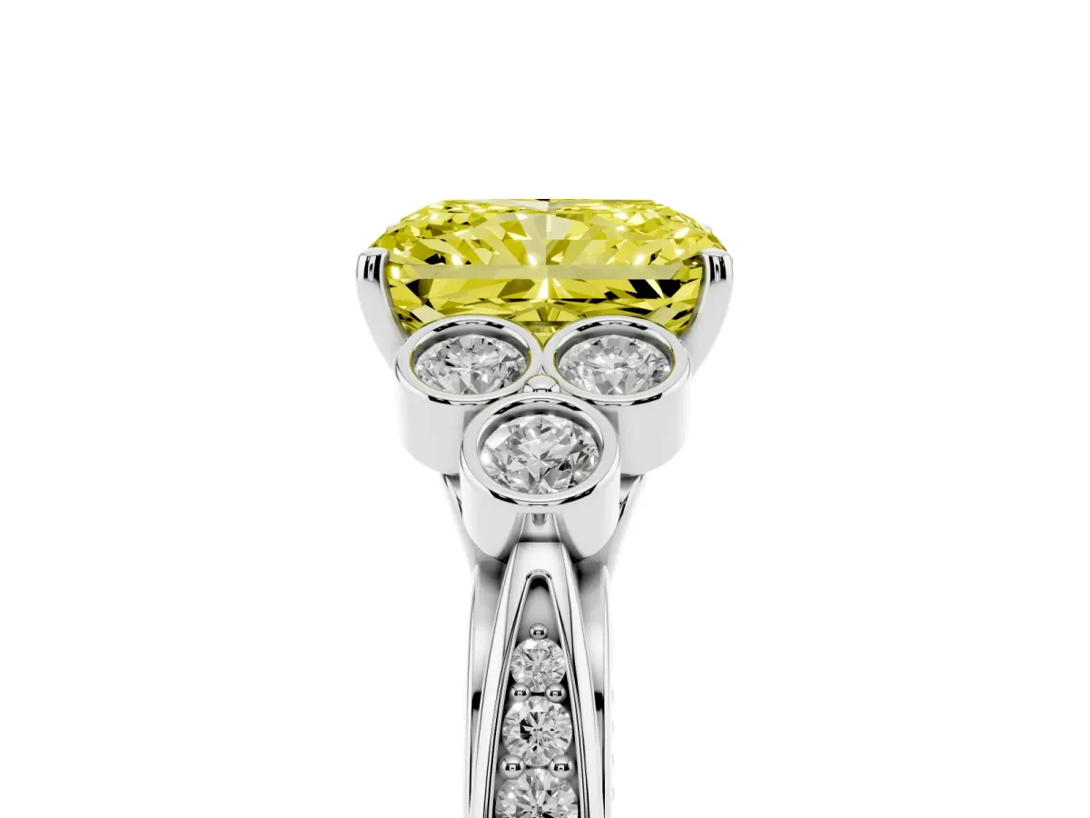 Fancy Yellow Radiant Cut Cut Diamond Engagement Ring with Bezel Set Round Side Stones and Prong Setting Platinum