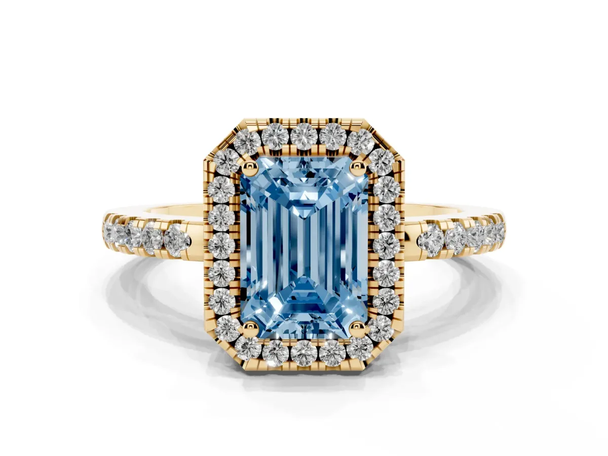 Fancy Blue Emerald Cut Halo Diamond Engagement Ring with Pavé Band and Four-Prong Setting Yellow gold