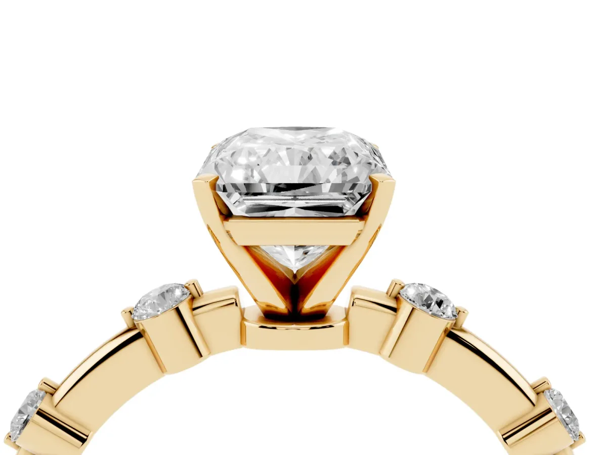 Radiant Cut Solitaire Diamond Ring with Bezel Set Side Stones and Prong Setting Yellow gold