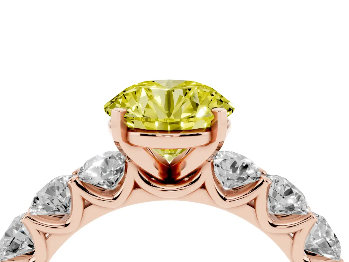 Fancy Yellow Round Cut Diamond Prong Setting with Side Stones on a Pave Band Rose gold