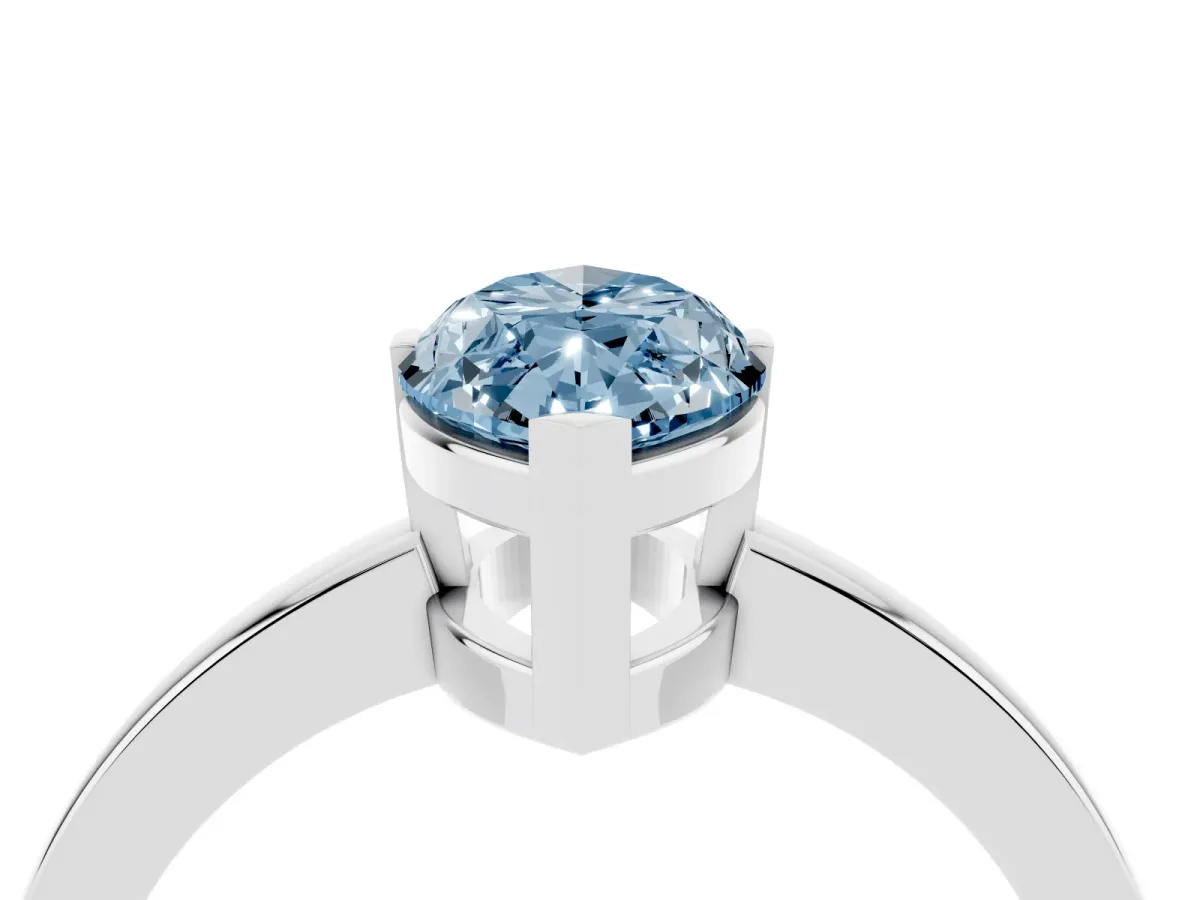 Fancy Blue Marquise Cut Cut Solitaire Ring with Four-Prong Setting and Classic Band Silver