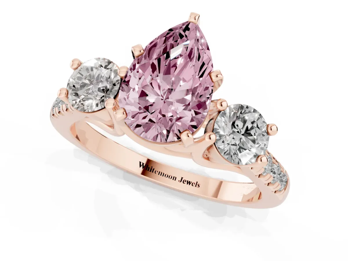 Fancy Pink Three-Stone Pear Cut Diamond Pavé Band with Four-Prong Setting Rose gold