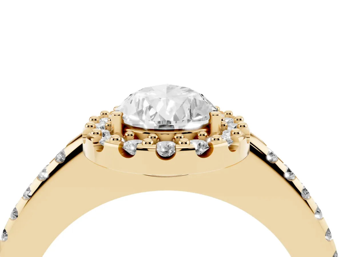 Pear Cut Diamond Pavé Halo Ring with Four-Prong Setting Yellow gold
