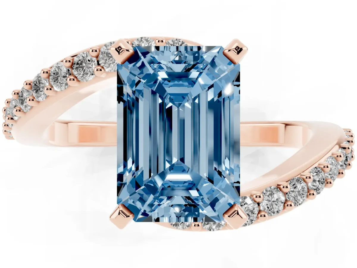 Fancy Blue Emerald Cut Solitaire Twist Band with Pave Set Diamonds and Four-Prong Setting Rose gold
