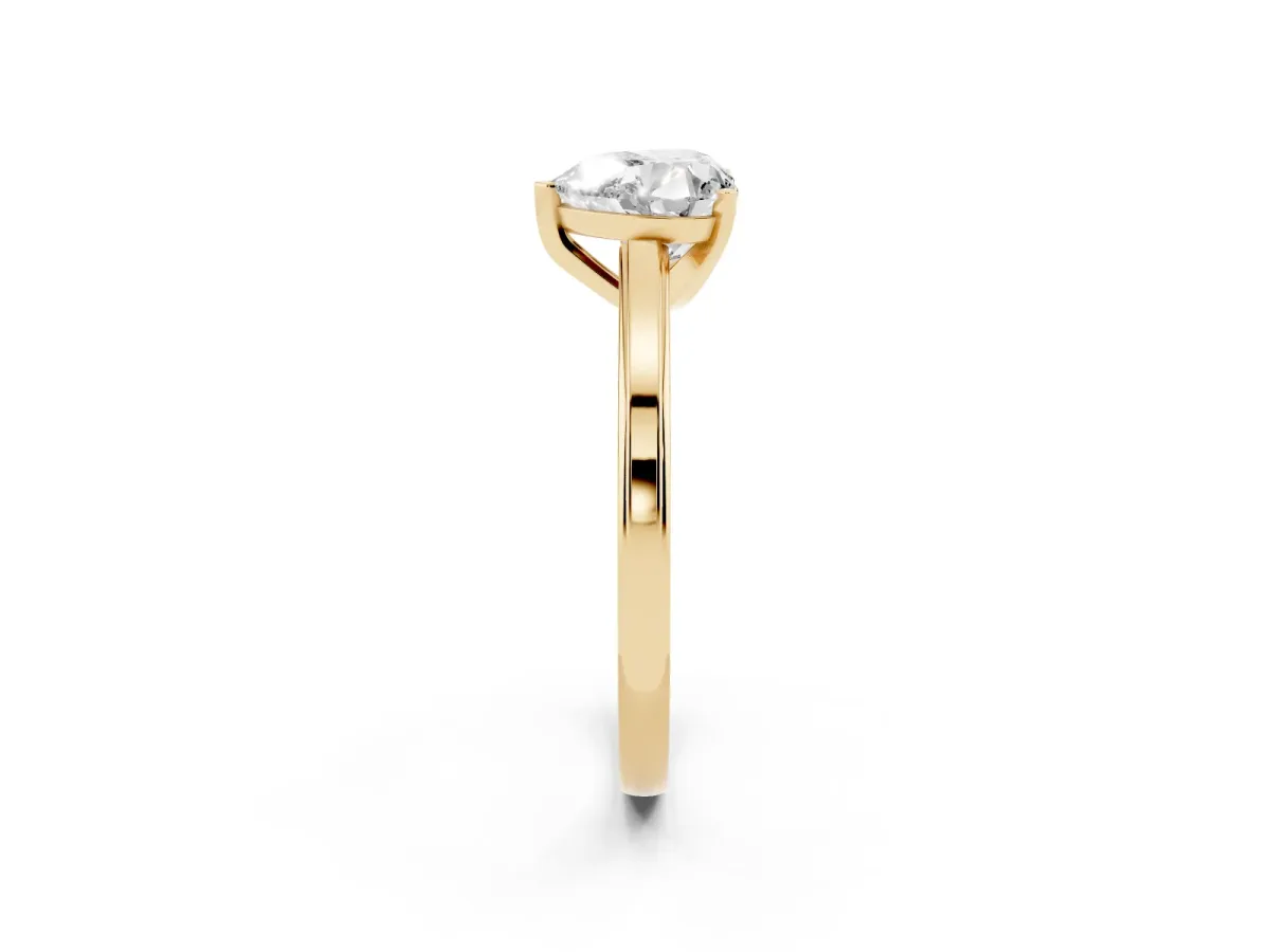Heart Cut Solitaire Diamond Ring with Four-Prong Setting and Classic Band Yellow gold