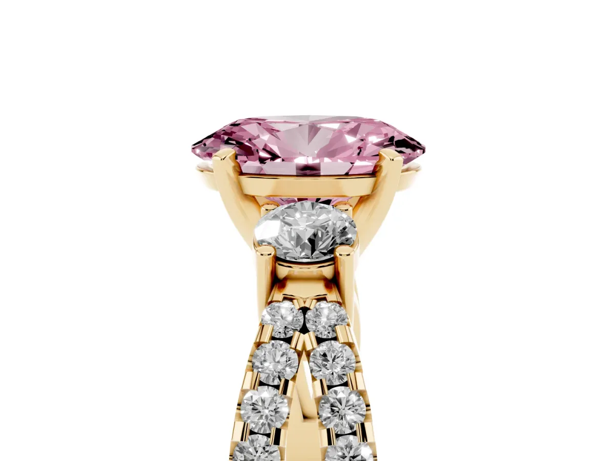 Fancy Pink Oval Cut Diamond Three-Stone Ring with Pavé Split Shank and Four-Prong Setting Yellow gold
