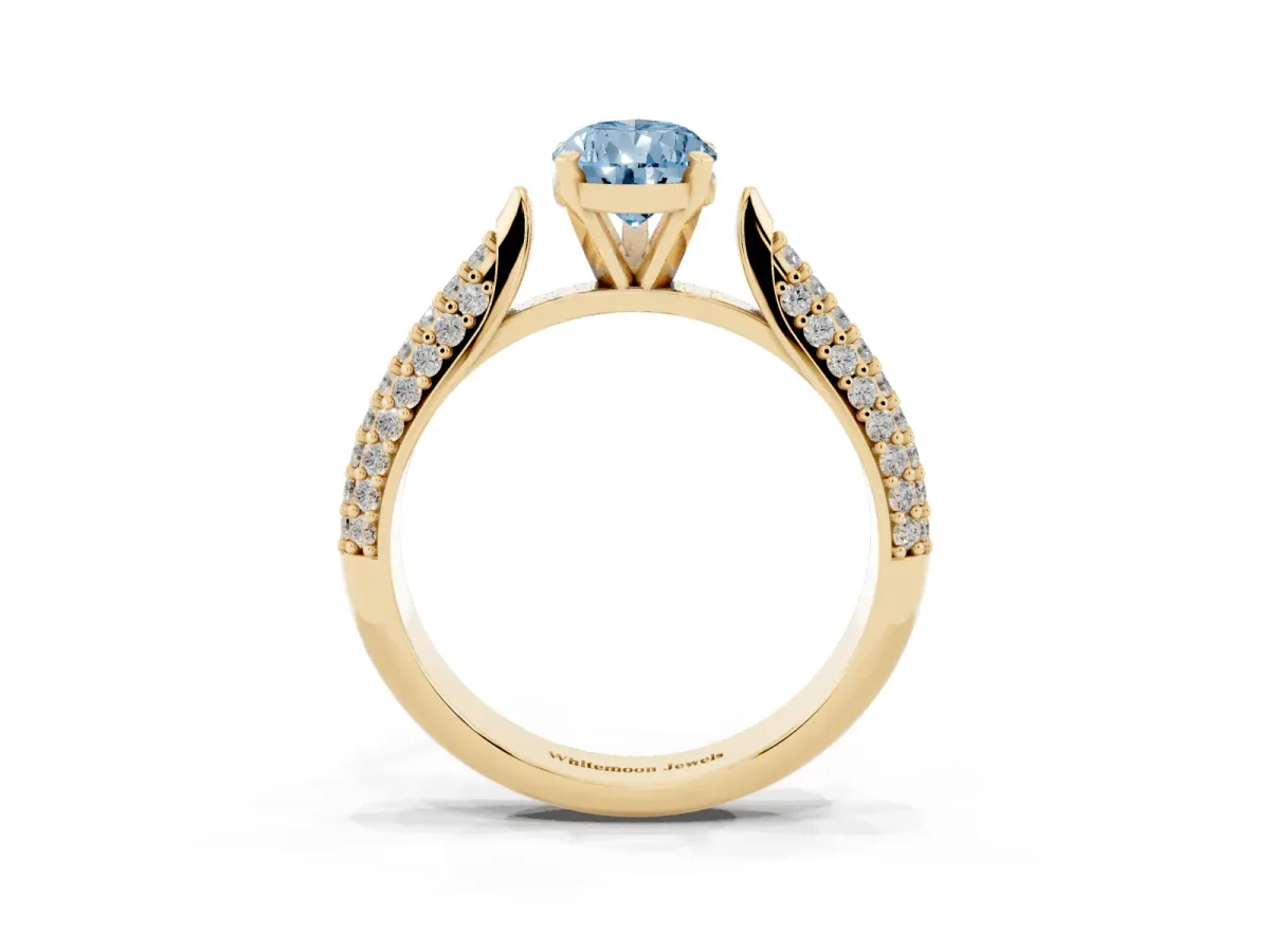 Fancy Blue Pear Cut Diamond Solitaire Engagement Ring with Multi-Row Round Pavé Band and Prong Setting Yellow gold