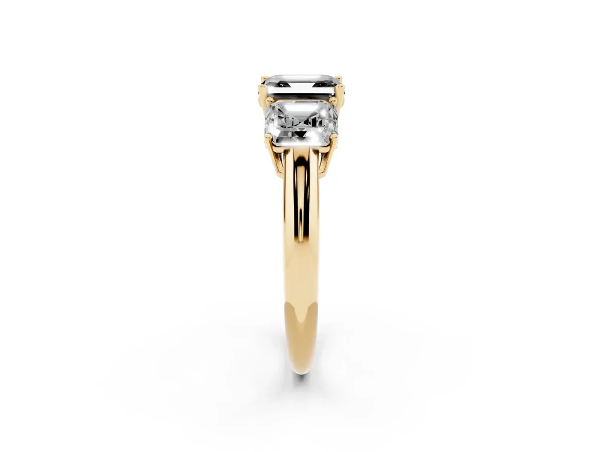 Fancy Black Three-Stone Asscher Cut Cut Diamond Engagement Ring with Prong Setting on a White Gold Band Yellow gold