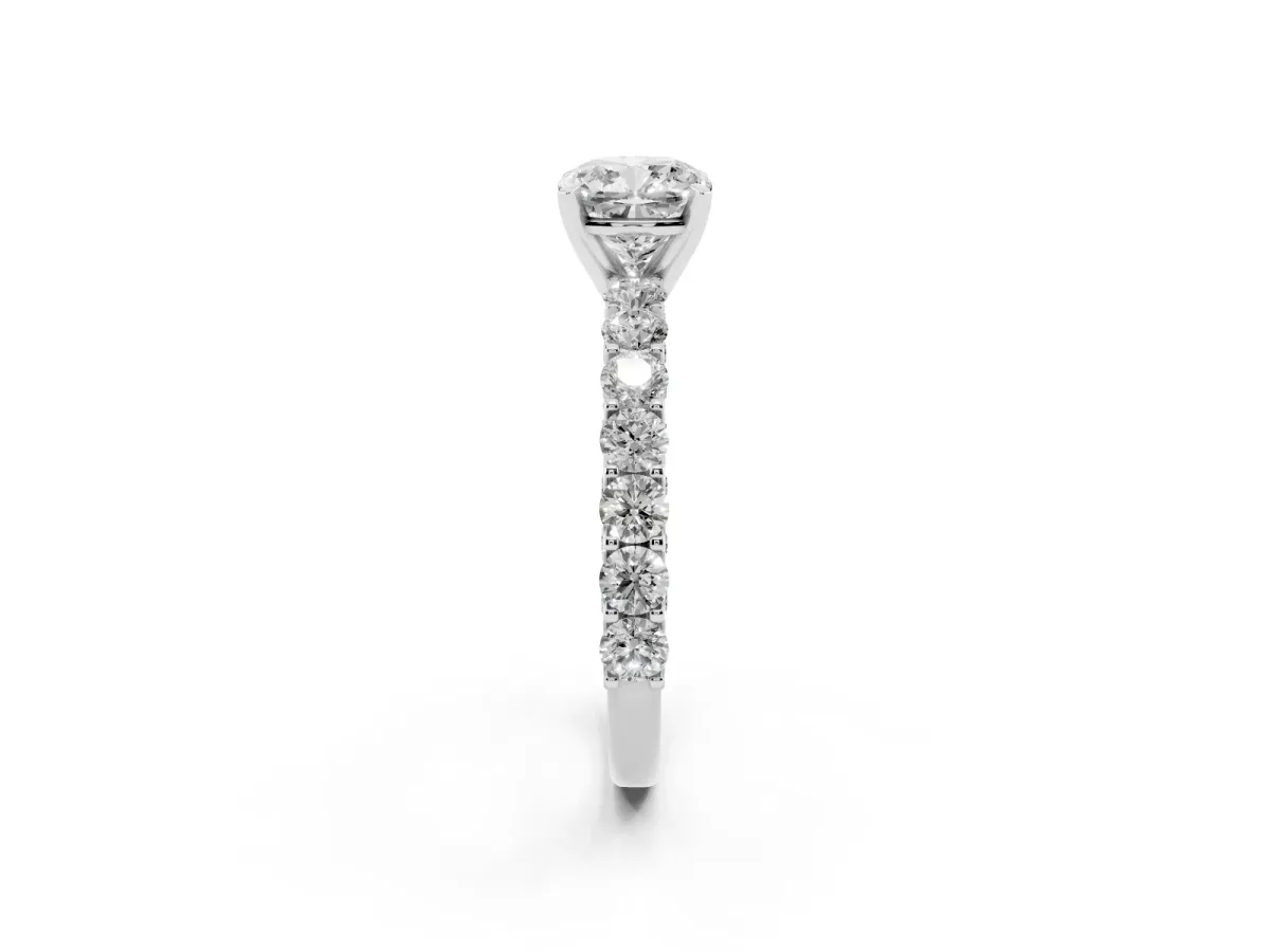 Cushion Cut Diamond Solitaire Ring with Shared Prong Pavé Band and Four-Prong Setting Silver