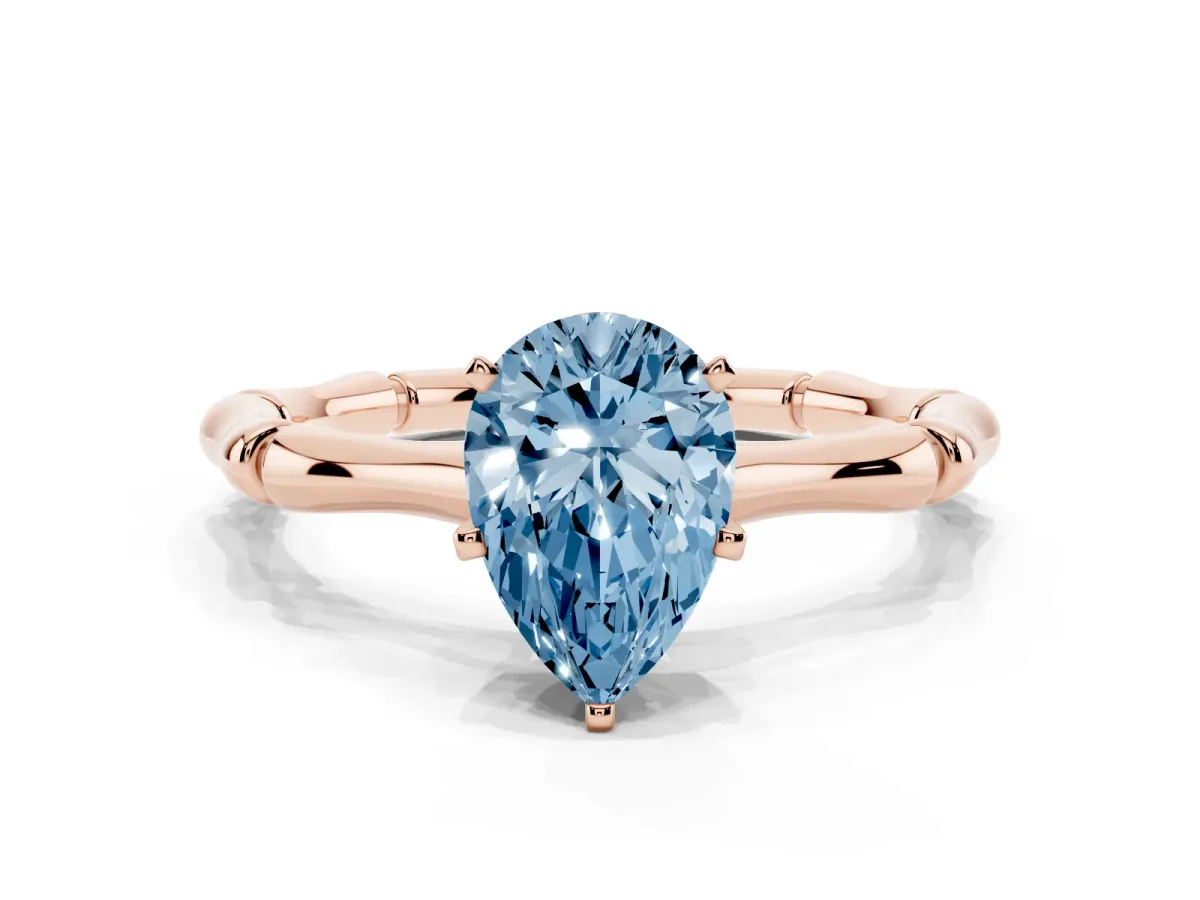 Fancy Blue Pear Cut Solitaire Diamond Ring with Bamboo Band and Four-Prong Setting Rose gold