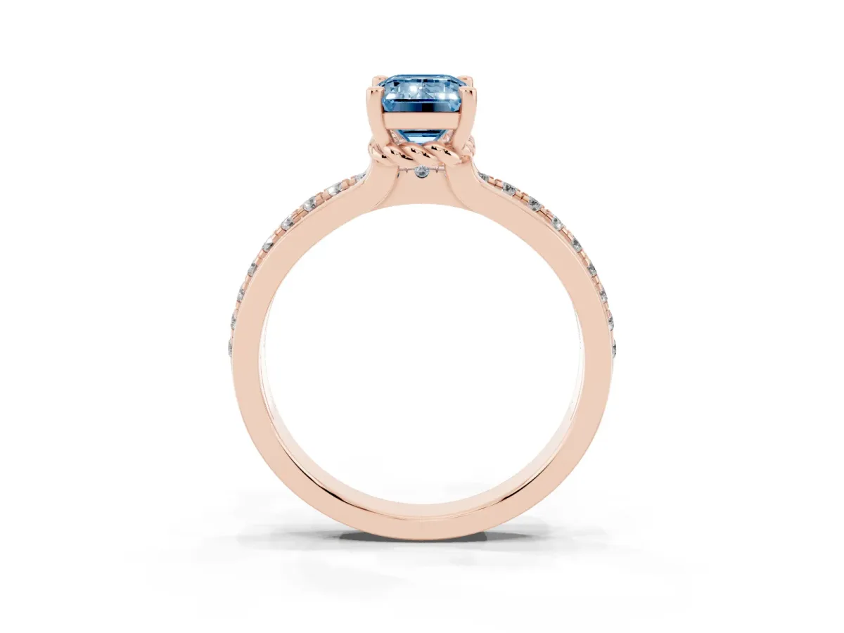Fancy Blue Emerald Cut Solitaire Diamond Ring with Channel Set Band and Six-Prong Setting Rose gold