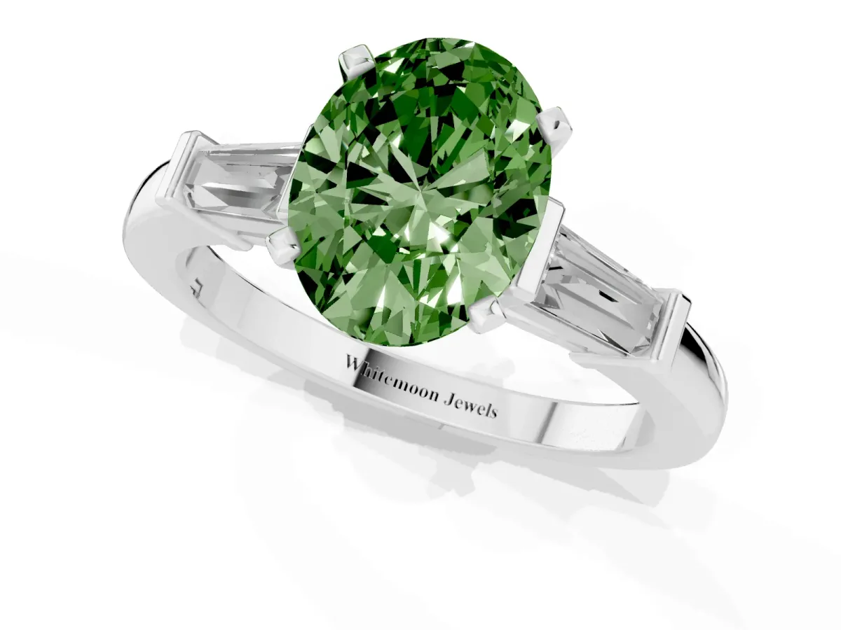 Fancy Green Oval Cut Cut Diamond Solitaire Ring with Tapered Baguette Accents and Four-Prong Setting Platinum