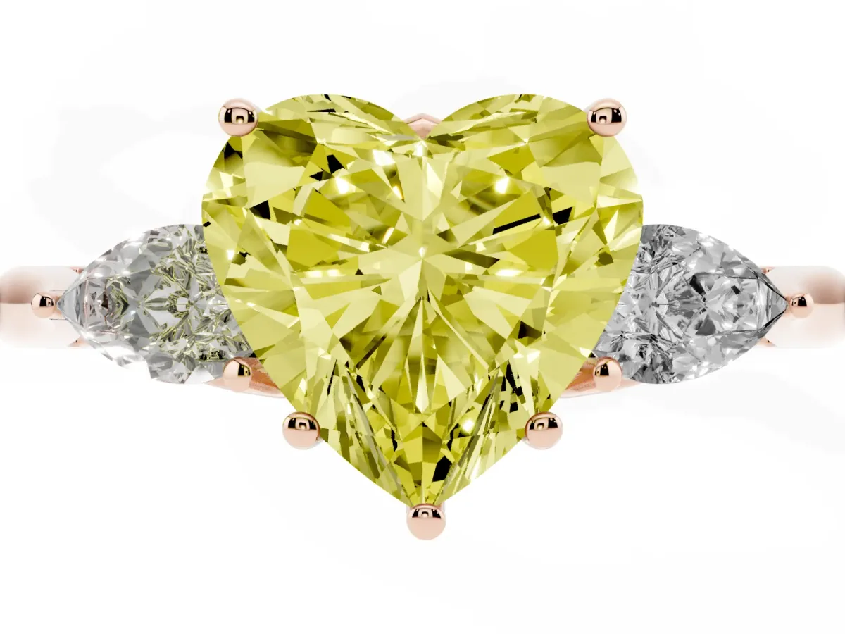 Fancy Yellow Three-Stone Heart Cut Brilliant Diamond Solitaire Ring with Tapered Band and Four-Prong Setting Rose gold
