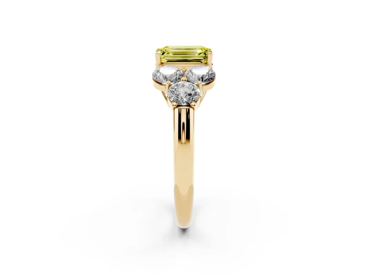 Fancy Yellow Emerald Cut Cut Diamond Cluster Ring with Round Accent Stones and Prong Setting on a Classic Band Yellow gold