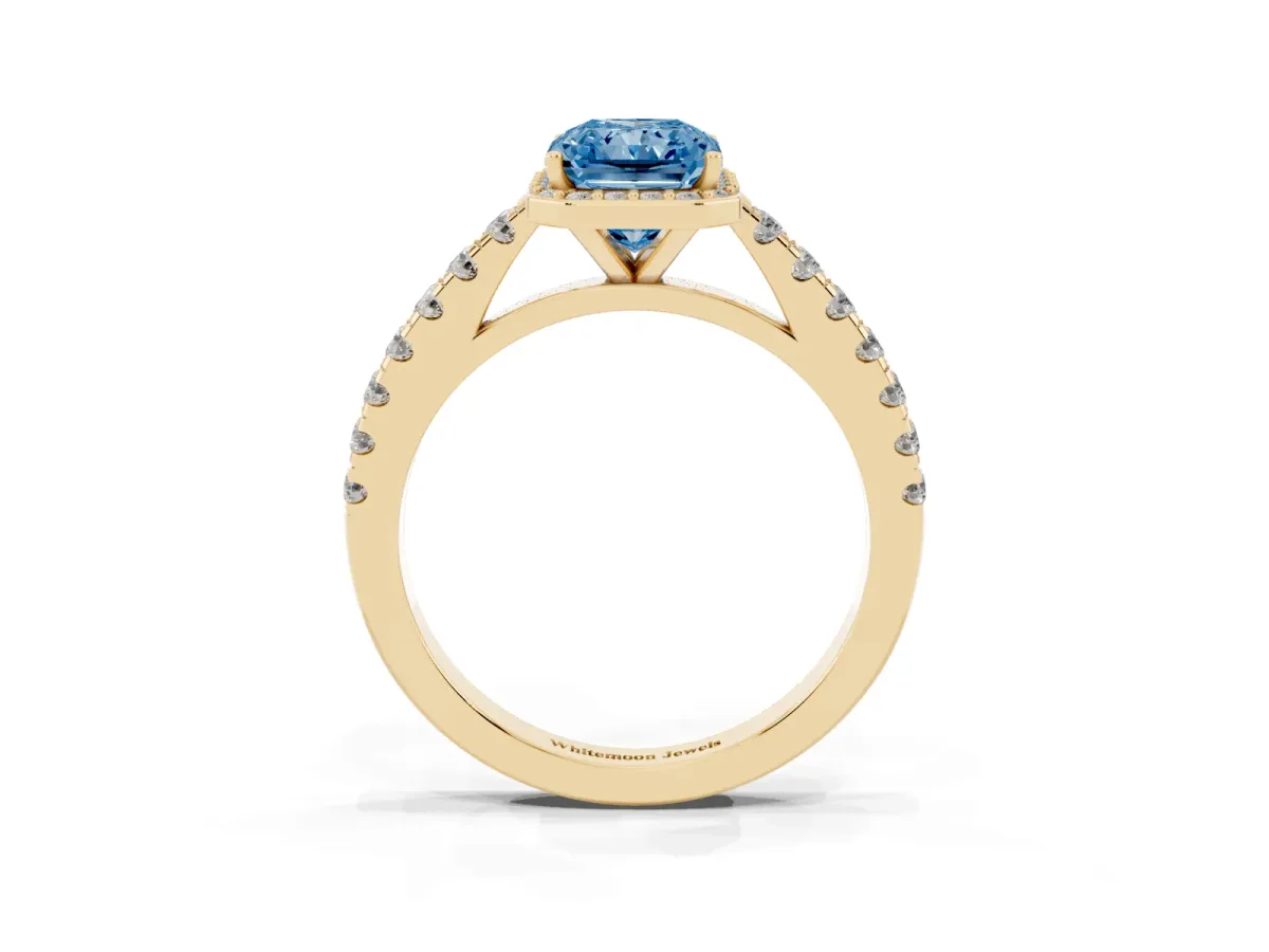 Fancy Blue Radiant Cut Cut Halo Diamond Engagement Ring with Pave Band and Four-Prong Setting Yellow gold