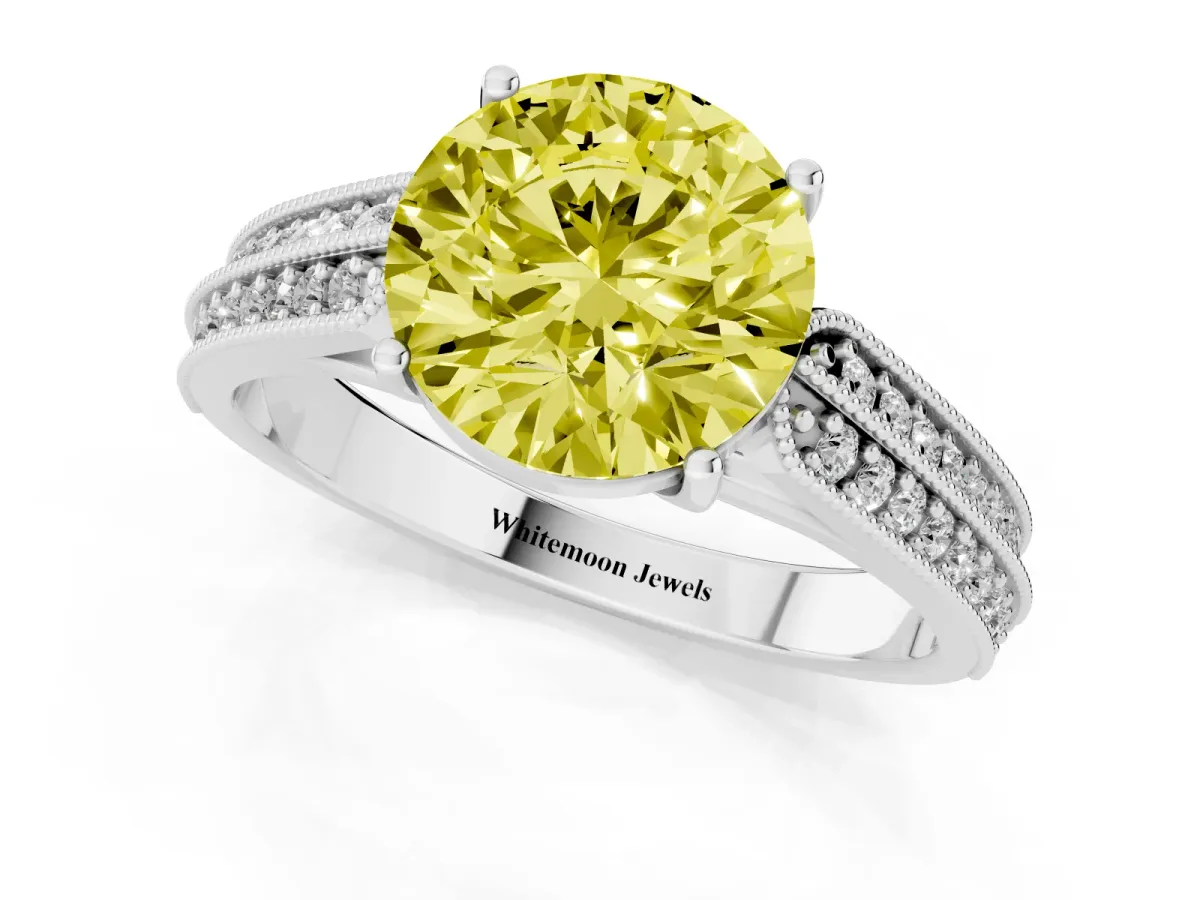 Fancy Yellow Round Cut Cut Pave Split Shank Engagement Ring with Four-Prong Setting White gold