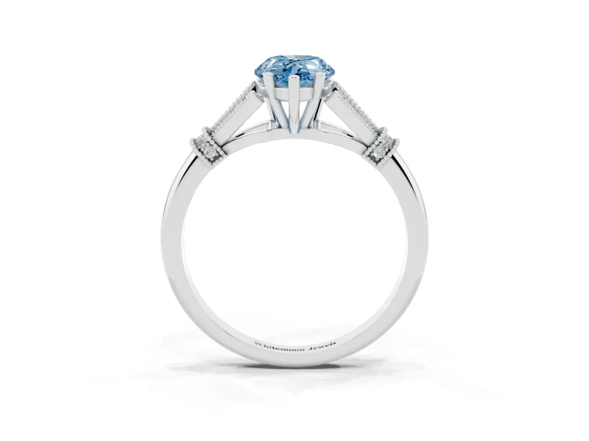 Fancy Blue Pear Cut Diamond Solitaire Ring with Floral Filigree and Pave Accents Silver