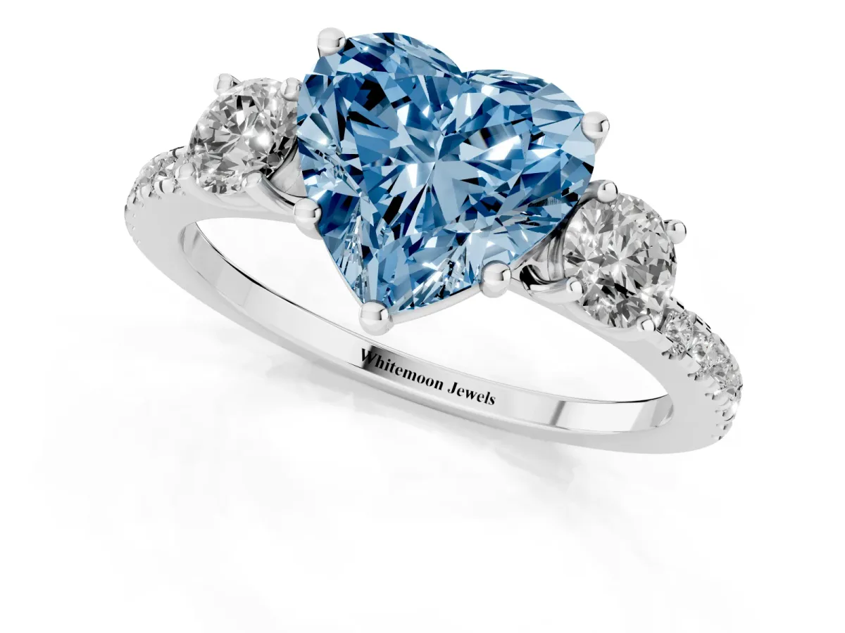Fancy Blue Three-Stone Heart Cut Cut Diamond Pavé Band with Prong Setting Platinum