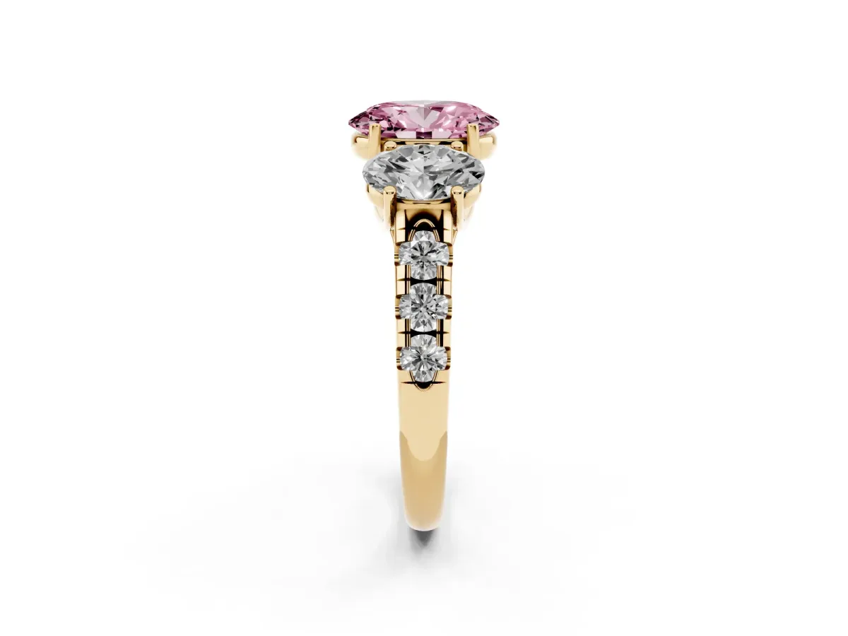 Fancy Pink Three-Stone Oval Cut Diamond Pavé Band with Prong Setting Yellow gold