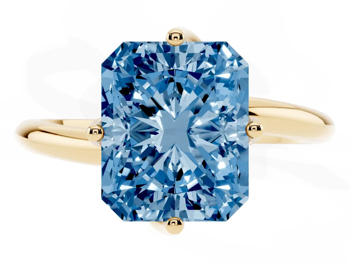Fancy Blue Radiant Cut Diamond Solitaire Engagement Ring with Four-Prong Setting and Classic Band Yellow gold