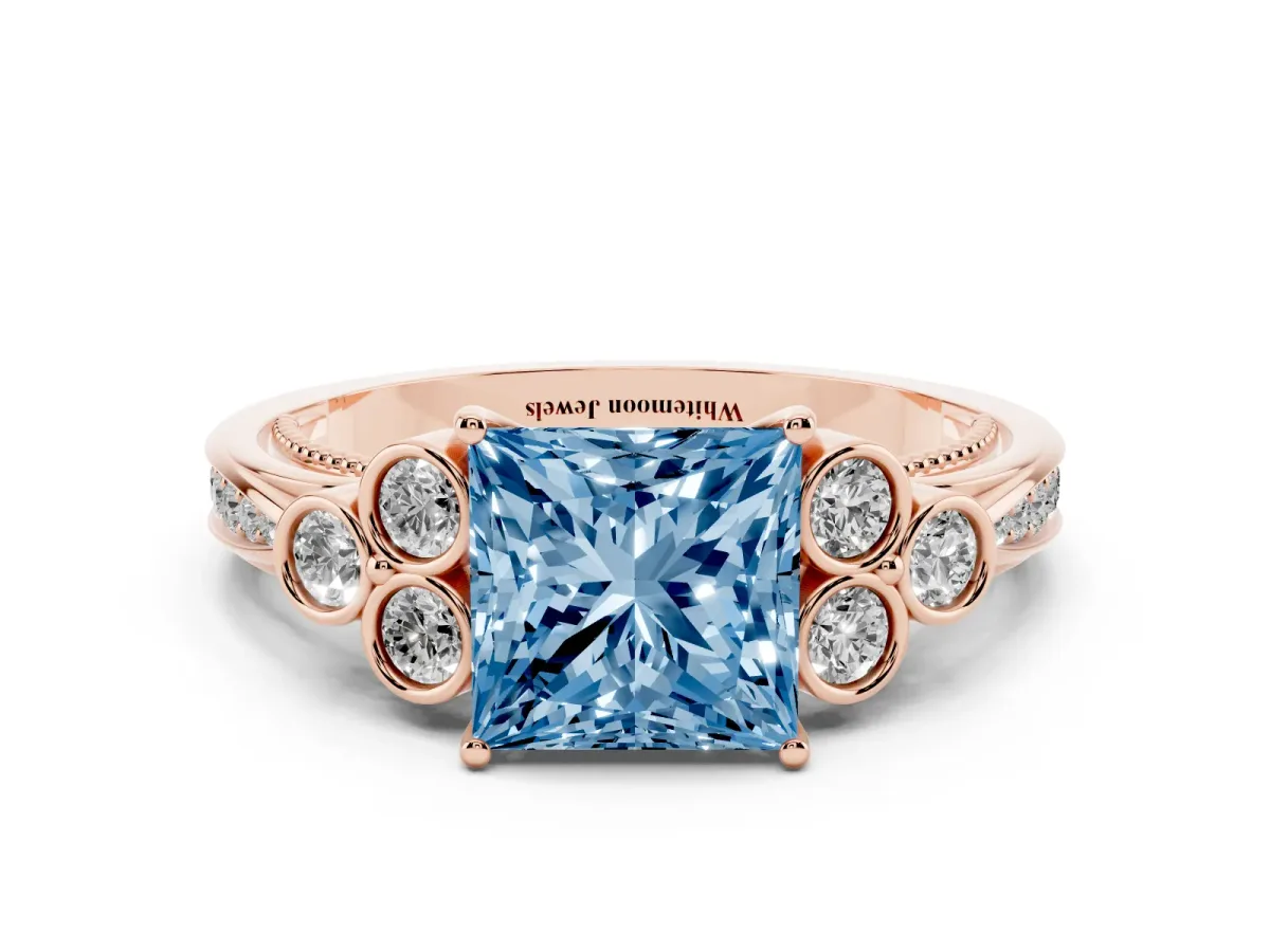 Fancy Blue Princess Cut Cut Diamond Engagement Ring with Bezel Set Round Side Stones and Prong Setting Rose gold
