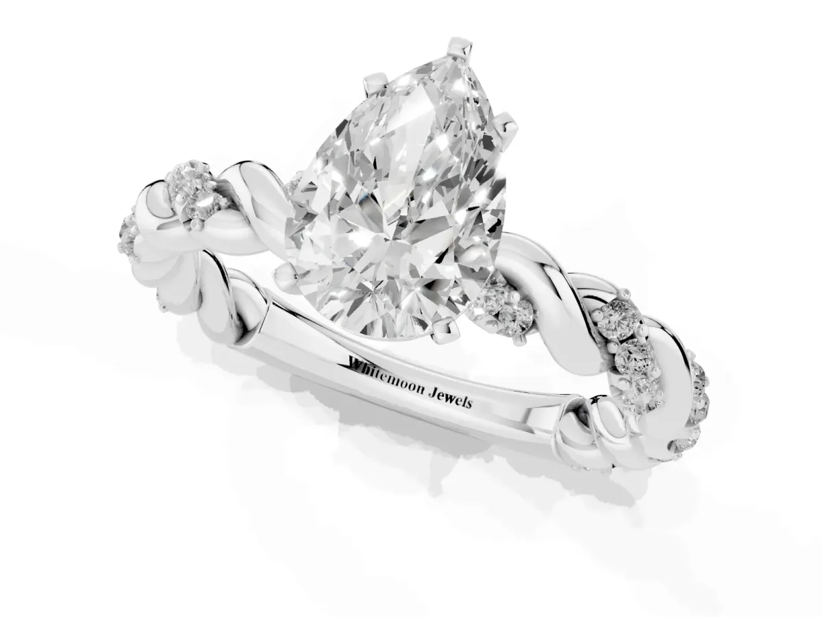 Pear Cut Diamond Solitaire Ring with Twisted Band and Pavé Accents Silver