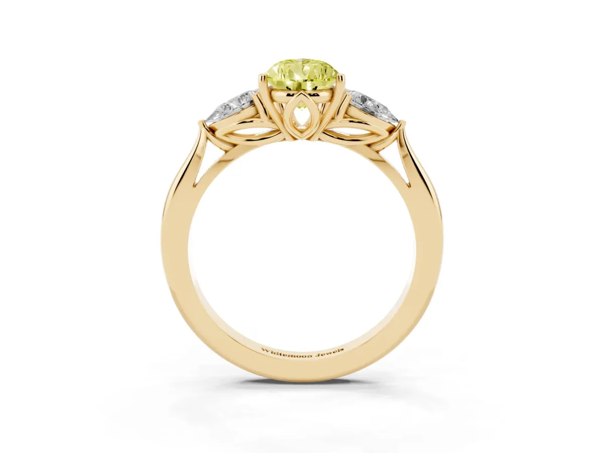 Fancy Yellow Three-Stone Pear Cut Diamond Ring with Pear Side Stones in Four-Prong Setting Yellow gold