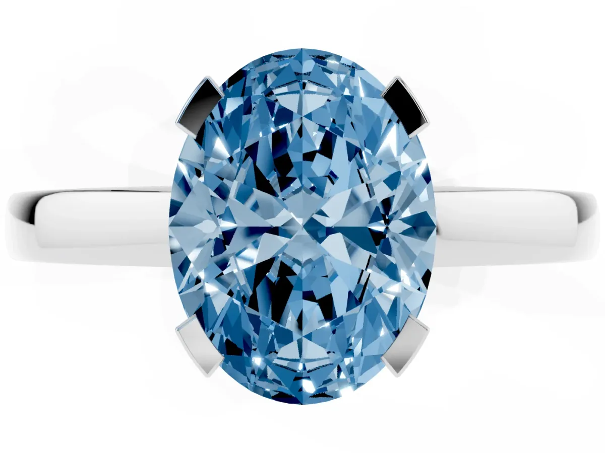 Fancy Blue Oval Cut Cut Solitaire Ring with Four-Prong Setting and Classic Band Silver