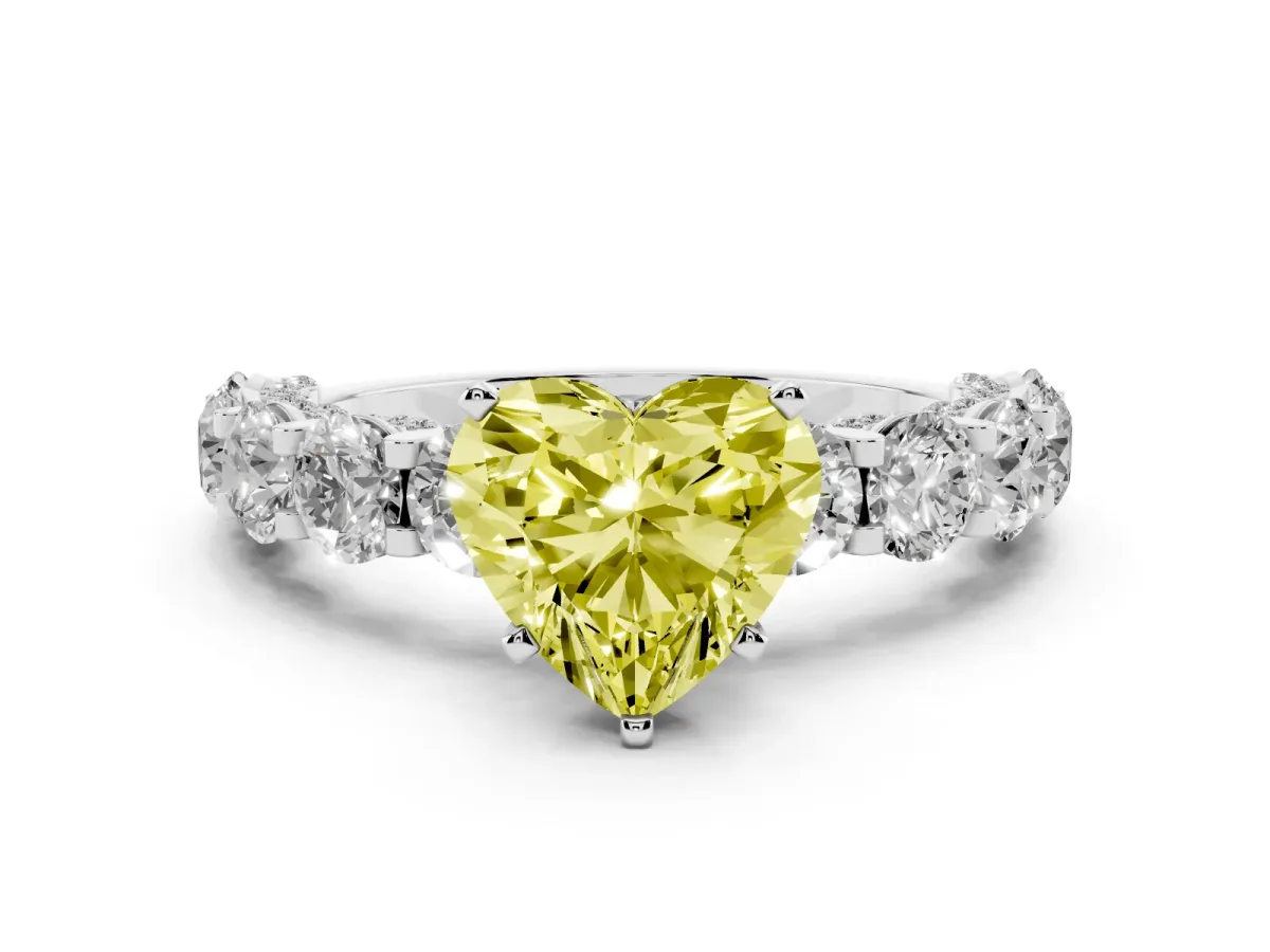 Fancy Yellow Heart Cut Diamond Side Stone Engagement Ring with Four-Prong Setting Silver