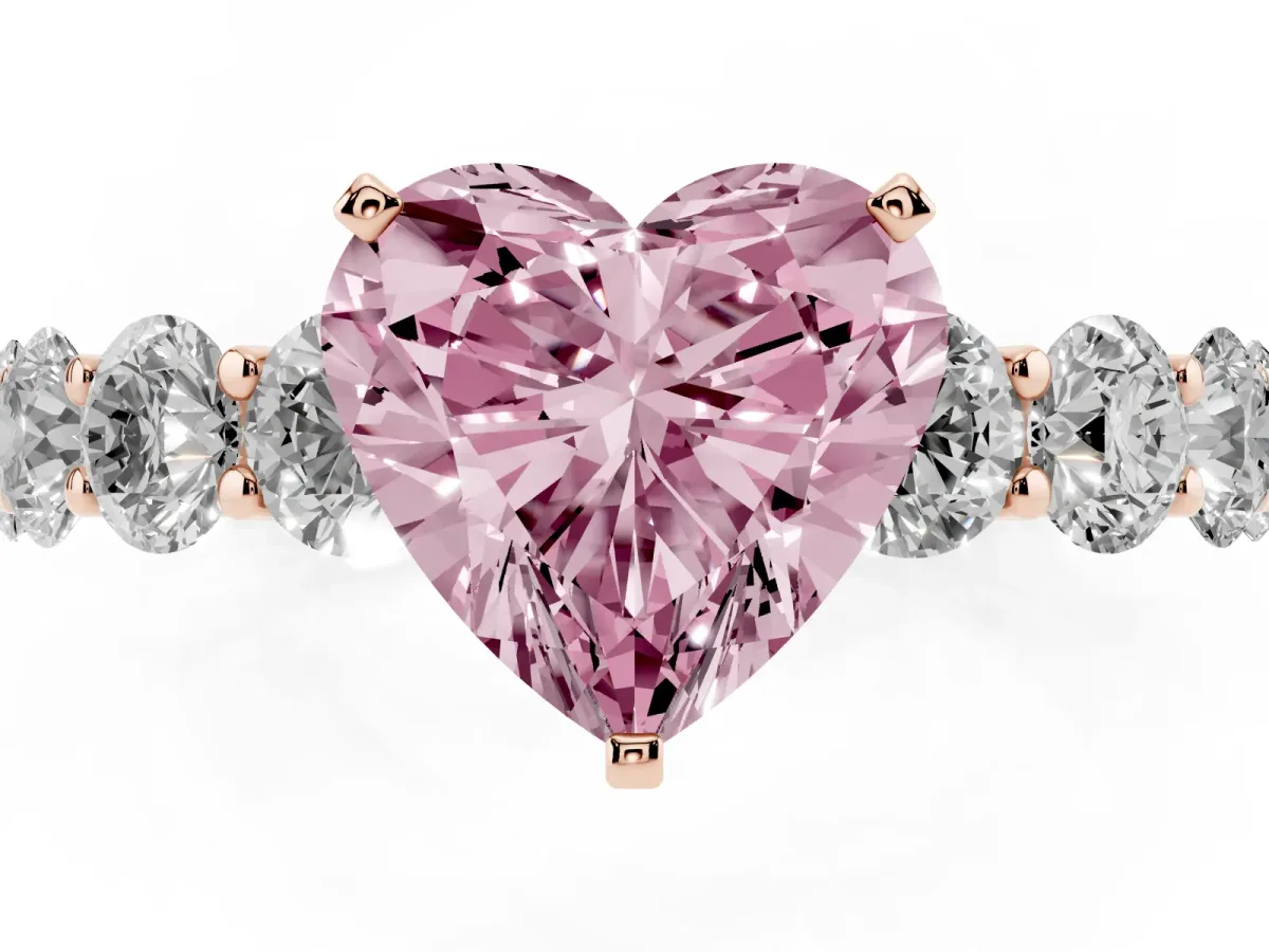 Fancy Pink Heart Cut Diamond Prong Setting with Side Stones on a Pave Band Rose gold