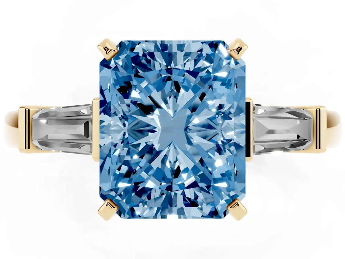Fancy Blue Radiant Cut Cut Diamond Solitaire Ring with Tapered Baguette Accents and Four-Prong Setting Yellow gold