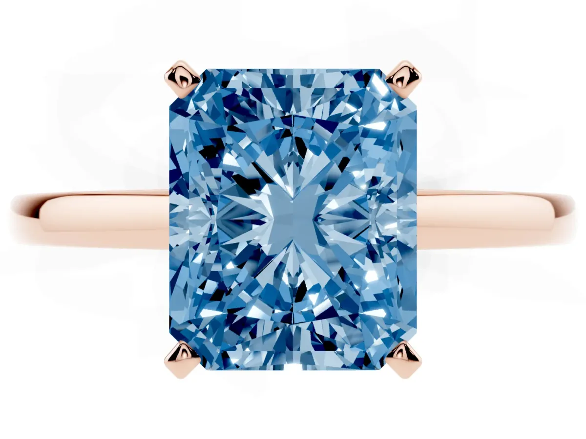 Fancy Blue Radiant Cut Solitaire Diamond Engagement Ring with Four-Prong Setting on a Classic Band Rose gold