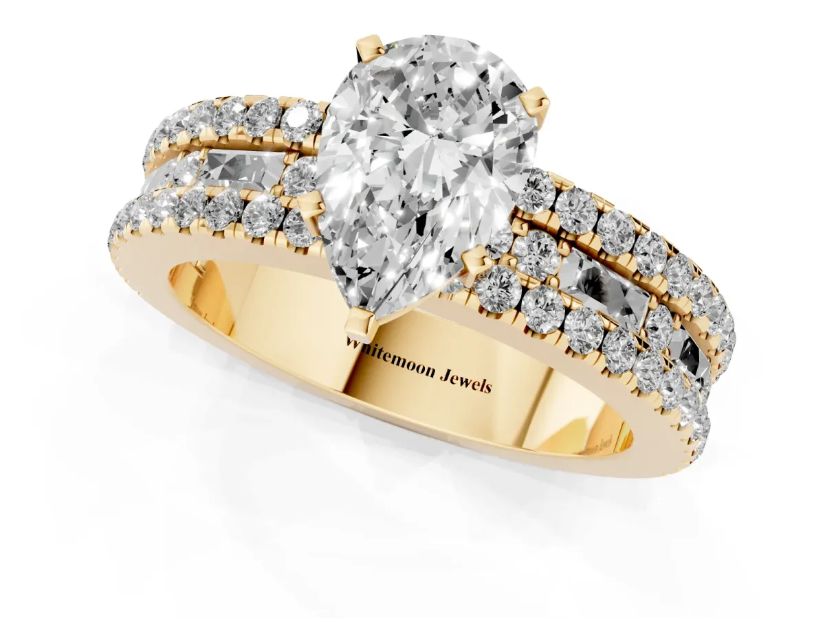 Pear Cut Diamond Solitaire Ring with Pavé and Channel Set Band Yellow gold