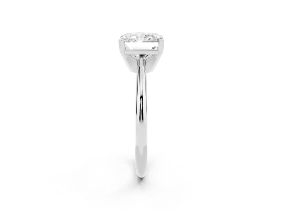 Radiant Cut Cut Solitaire Ring with Four-Prong Setting on a Classic Band Platinum