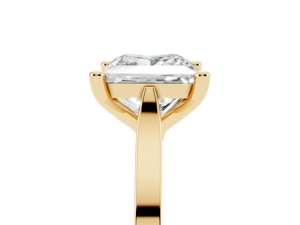 Princess Cut Solitaire Diamond Ring with Four-Prong Setting and Tapered Band Yellow gold