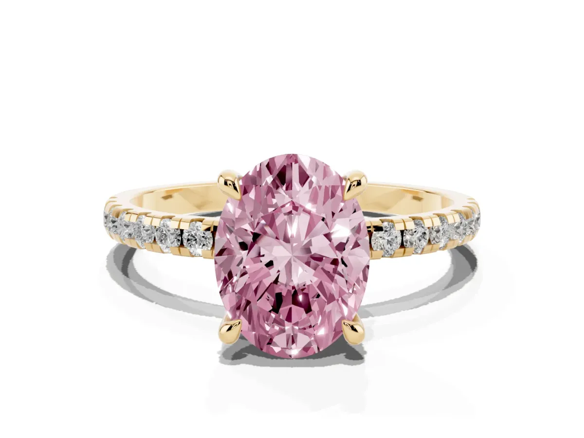 Fancy Pink Oval Cut Diamond Brilliant Solitaire Ring with Pavé Band and Four-Prong Setting Yellow gold
