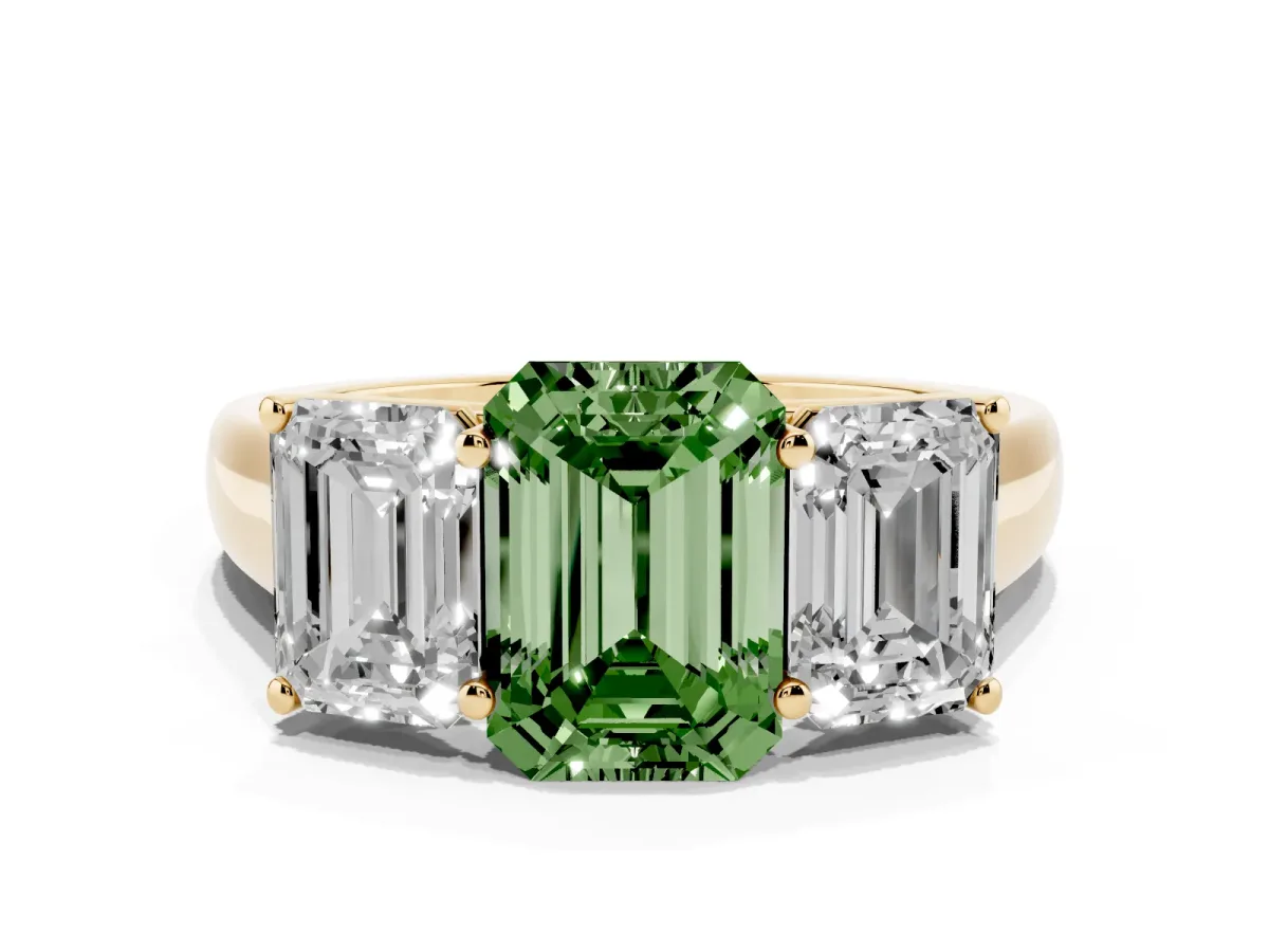 Fancy Green Emerald Cut Three-Stone Diamond Ring with Prong Setting on a Classic Band Yellow gold