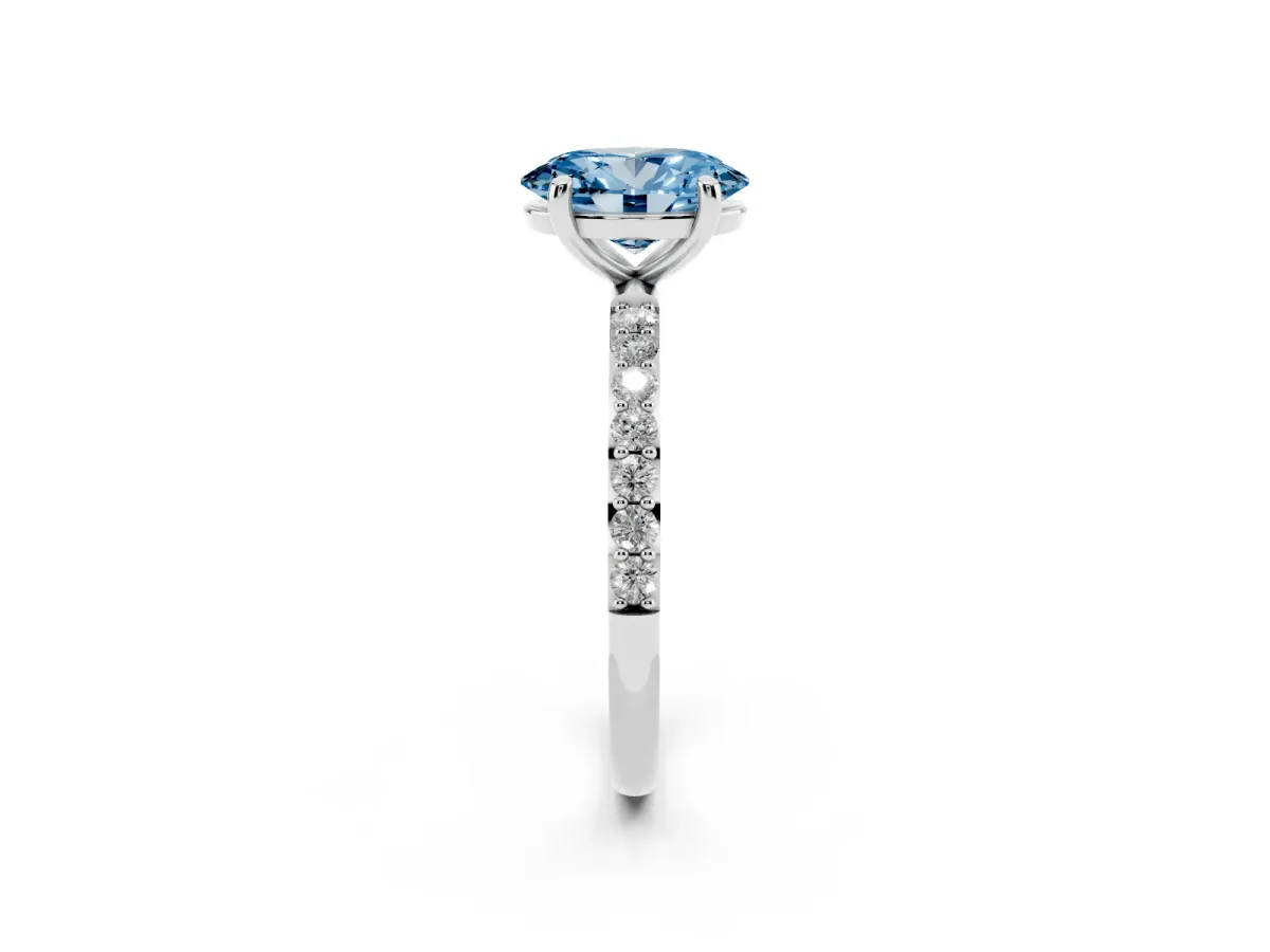 Fancy Blue Oval Cut Diamond Solitaire Ring with Round Pavé Band and Prong Setting Silver
