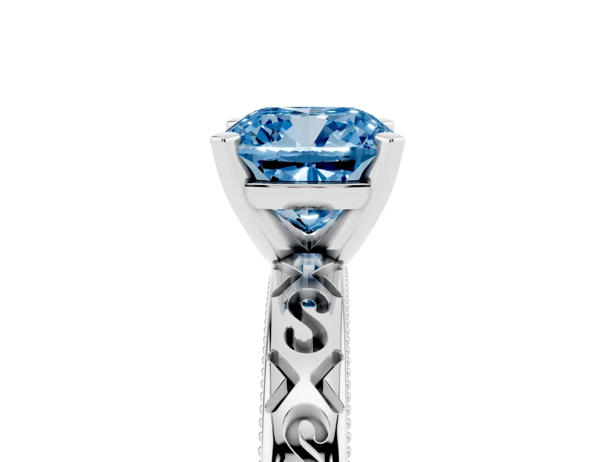 Fancy Blue Cushion Cut Solitaire Engagement Ring with Scrollwork Band and Four-Prong Setting Silver